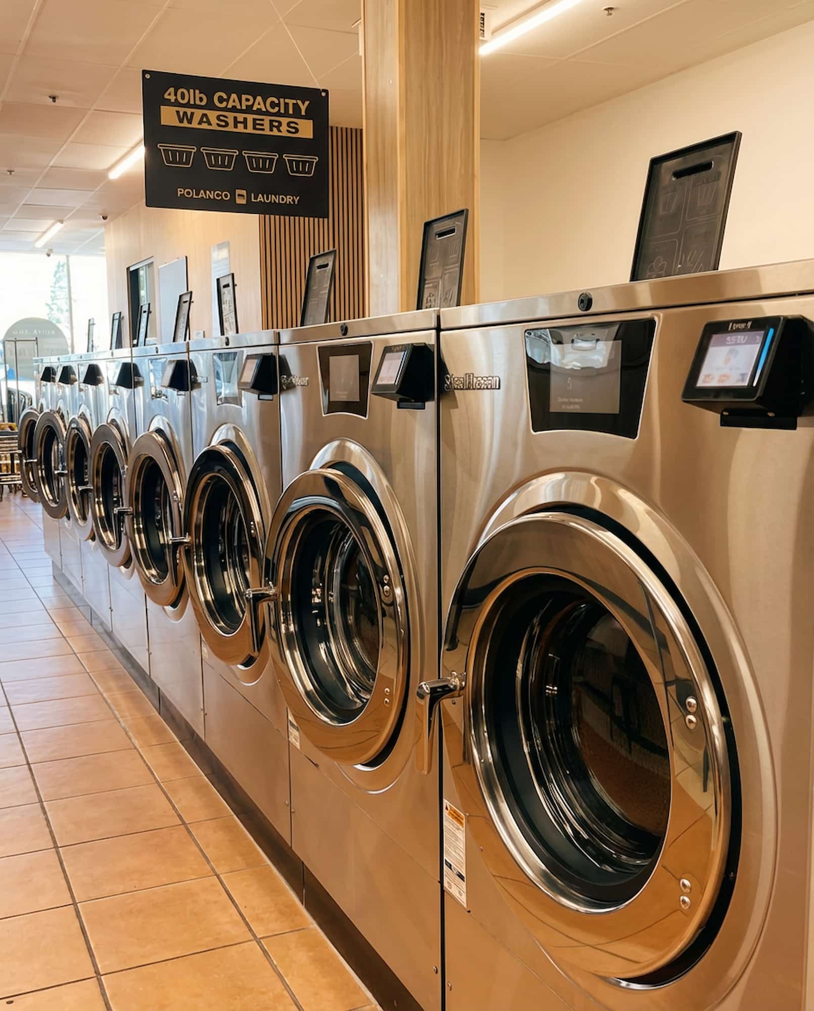 Polanco Laundry stainless steel 40lb capacity washers in Arleta, San Fernando Valley — clean, modern, coinless laundromat