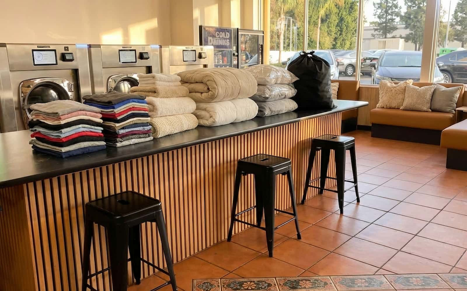 Neatly folded laundry from wash and fold service at Polanco Laundry